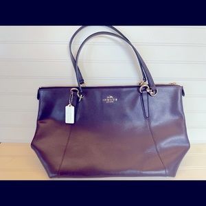 Plum coach shoulder bag